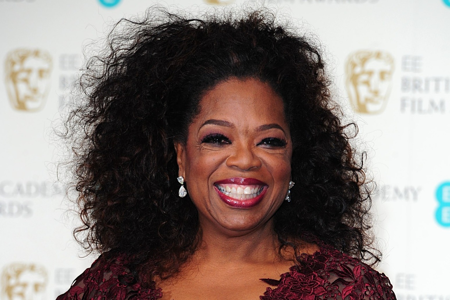 Oprah takes supplies to Maui shelter and urges more aid for wildfire evacuees 